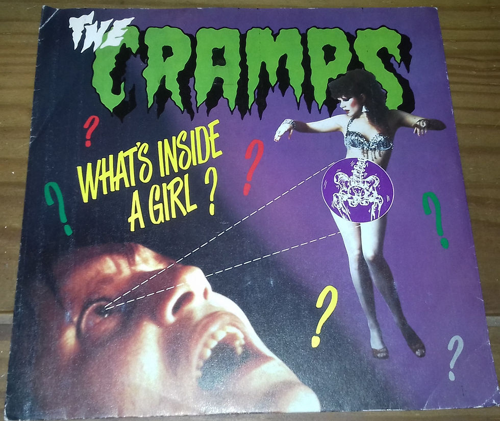 The Cramps - What's Inside A Girl? (7", Single, Pur) (Big Beat Records)