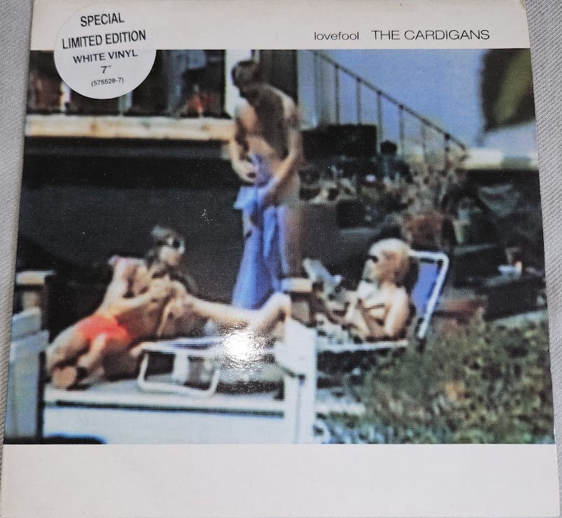 The Cardigans - Lovefool (7", Single, Ltd, Whi) (Stockholm Records, Trampolene)