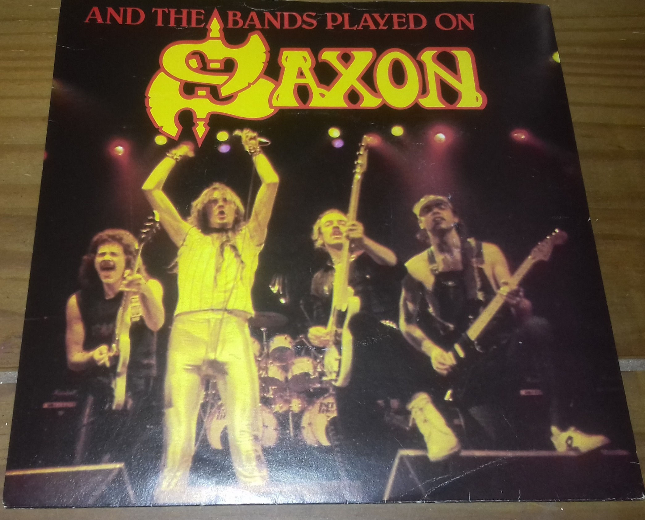 Saxon - And The Bands Played On (7", Single) (Carrere)