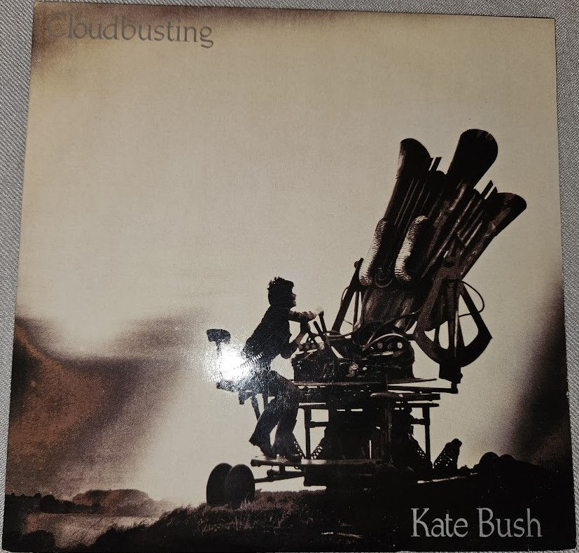 Kate Bush - Cloudbusting (7", Single, RP, Blu) (EMI)