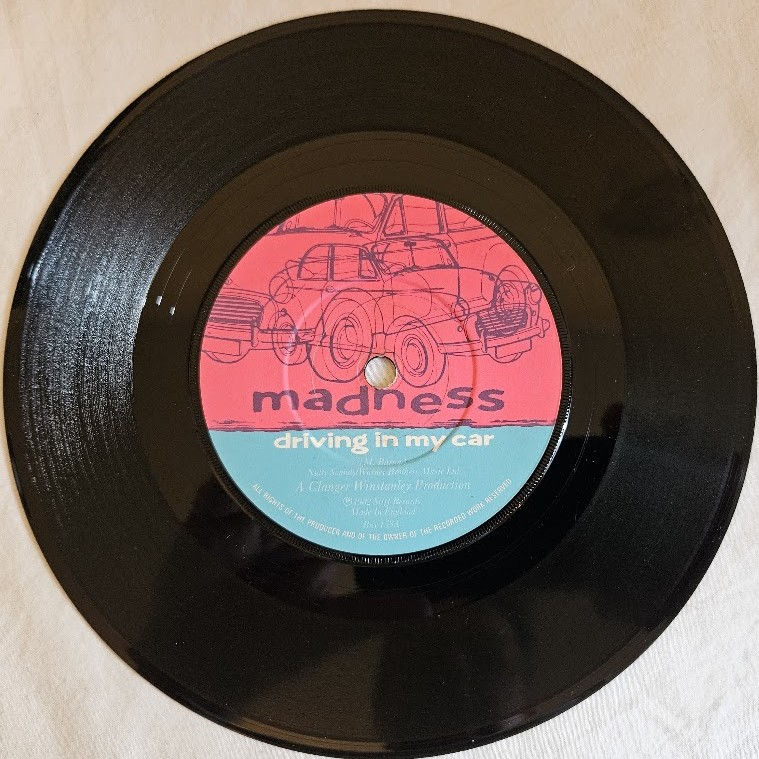 Miniature : Madness - Driving In My Car (7", Single, Pos)