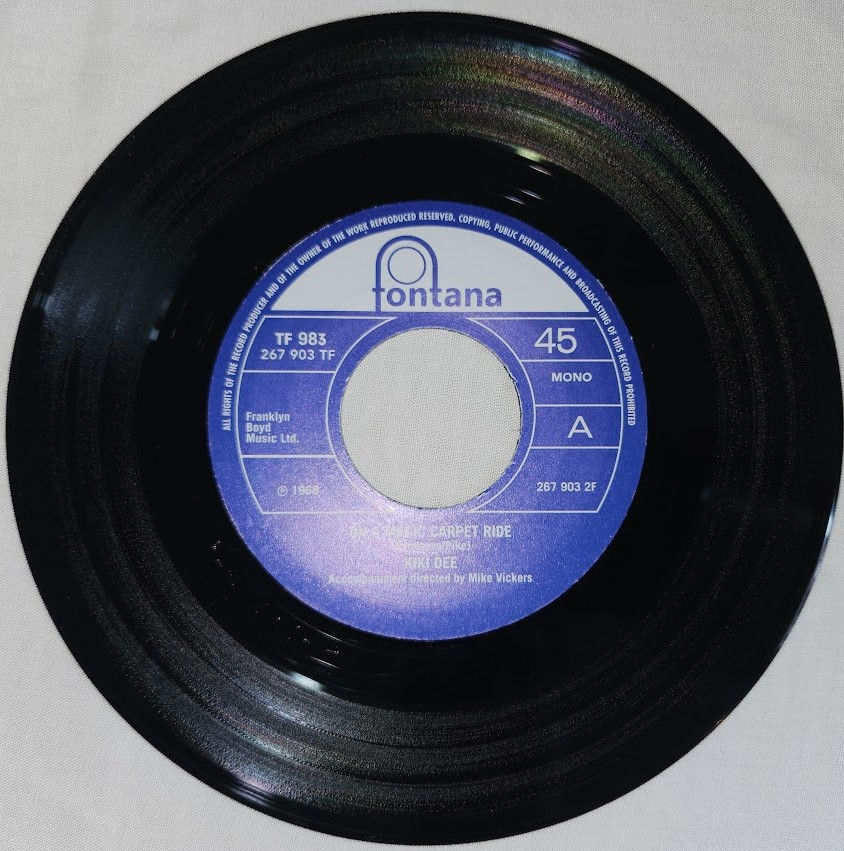 Kiki Dee – On A Magic Carpet Ride / Love Is A Warm Kind Of Sorrow (7") (Fontana)