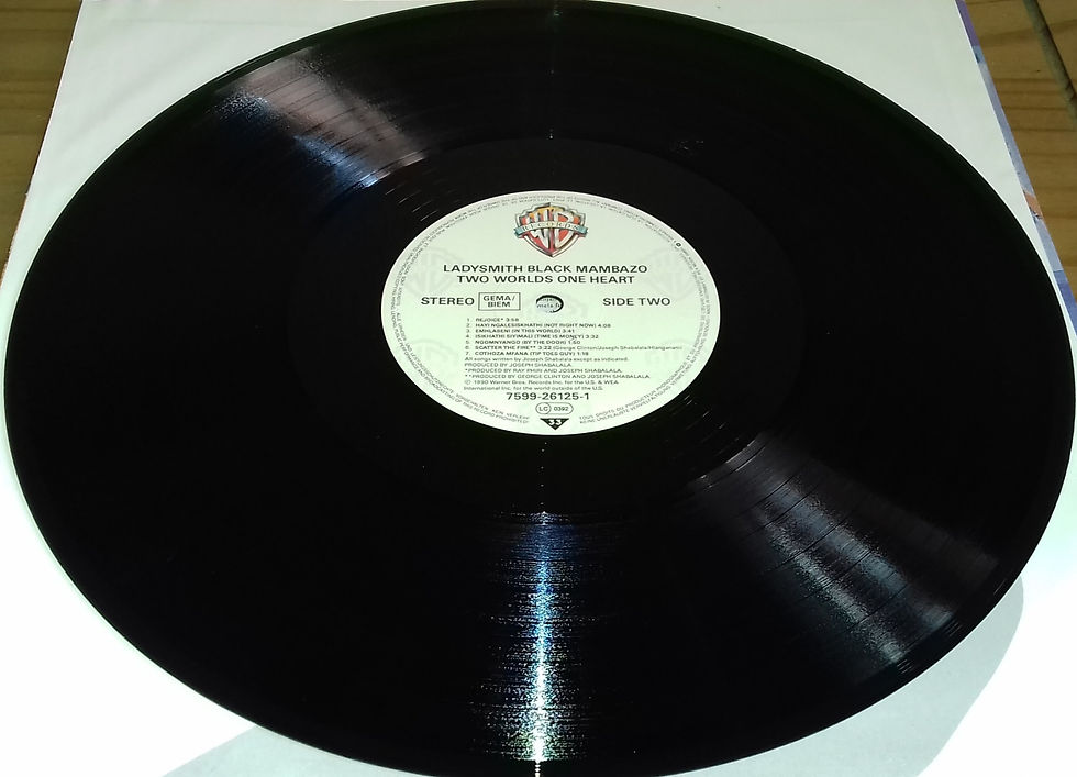 Miniature : Ladysmith Black Mambazo - Two Worlds One Heart (LP, Album) (Warner Bros. Records