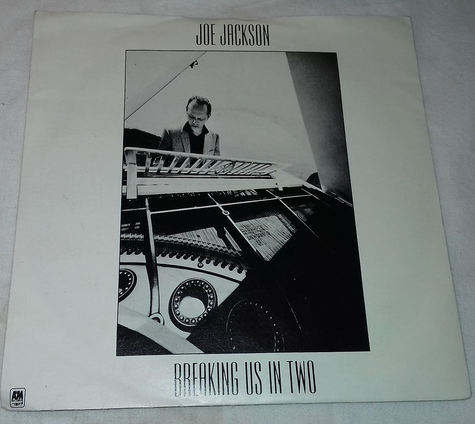 Joe Jackson - Breaking Us In Two (7", Single, RE) (A&M Records)