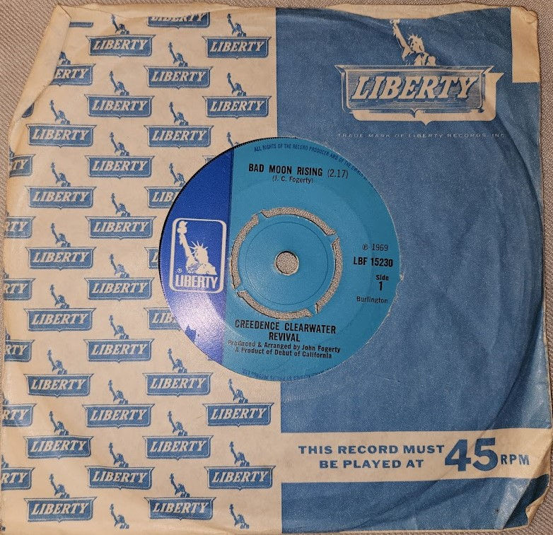 Creedence Clearwater Revival - Bad Moon Rising (7", Single, 4-P) (Liberty)
