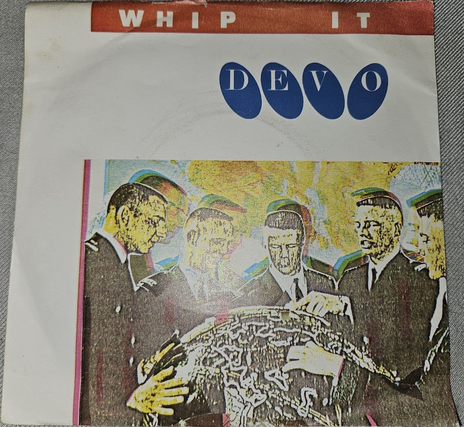 Devo - Whip It (7", Single) (Virgin)