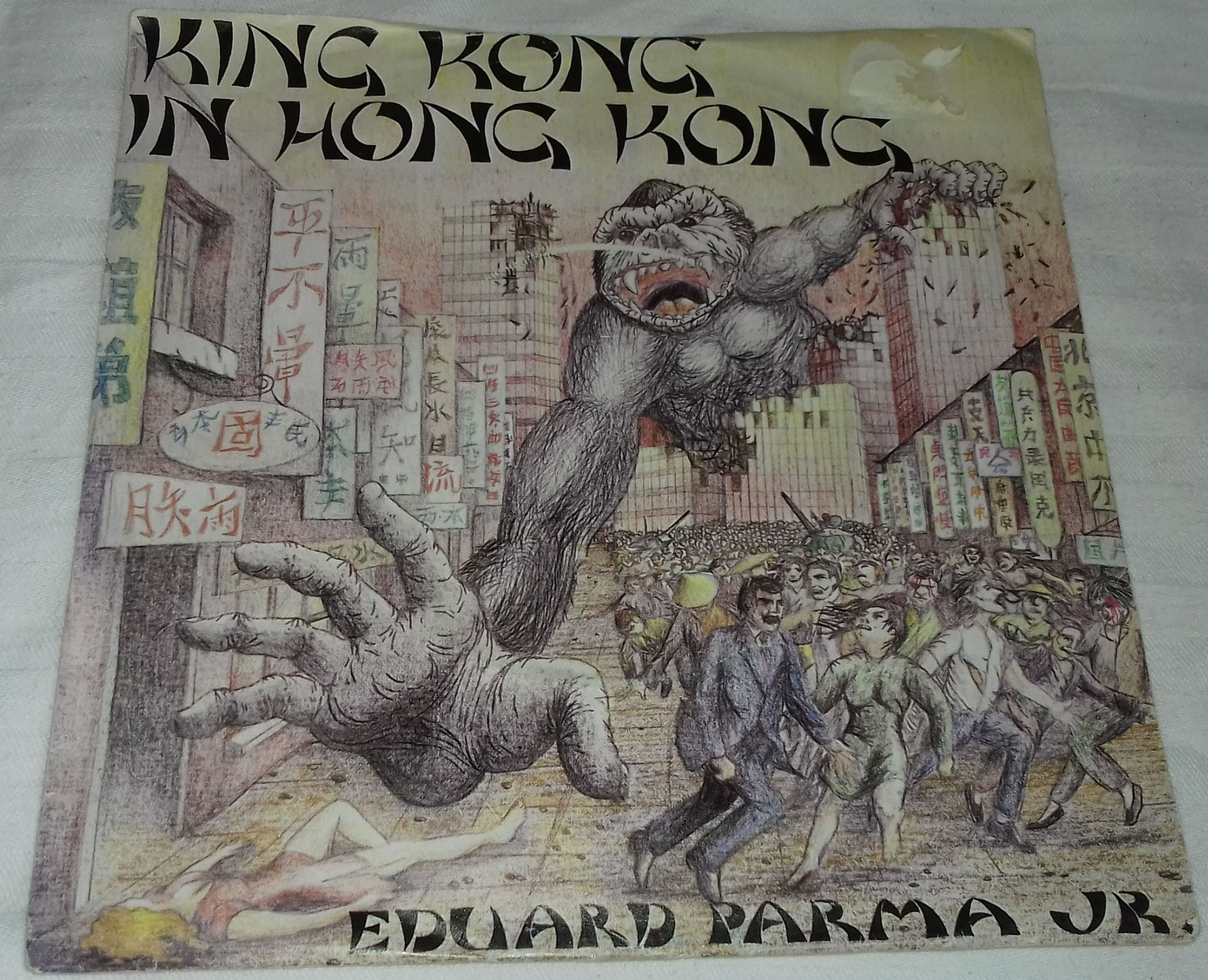 Eduard Parma Jr. - King Kong In Hong Kong (7") (Code Records)