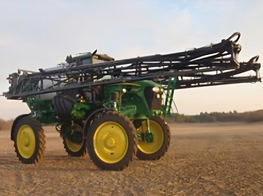 John Deere sprayer with super spray aluminum booms