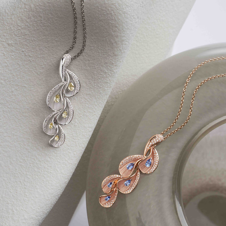 moondrops_pendants_fancy diamond & blu sapphires.jpeg