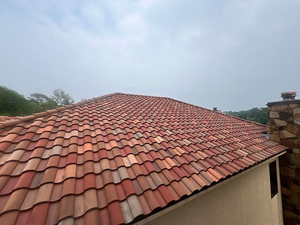 A picture of a clean terracotta roof. 