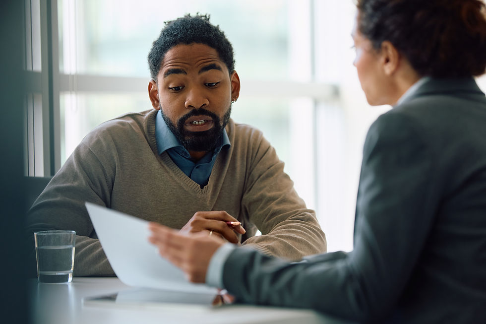 black-man-and-his-insurance-agent-analyzing-paperw-2024-04-09-23-38-27-utc.jpg