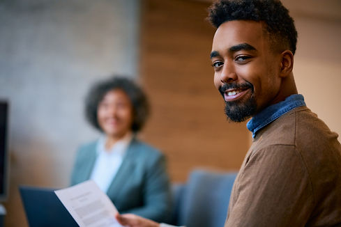 happy-black-man-on-a-meting-with-financial-advisor-2023-11-27-05-36-27-utc.jpg