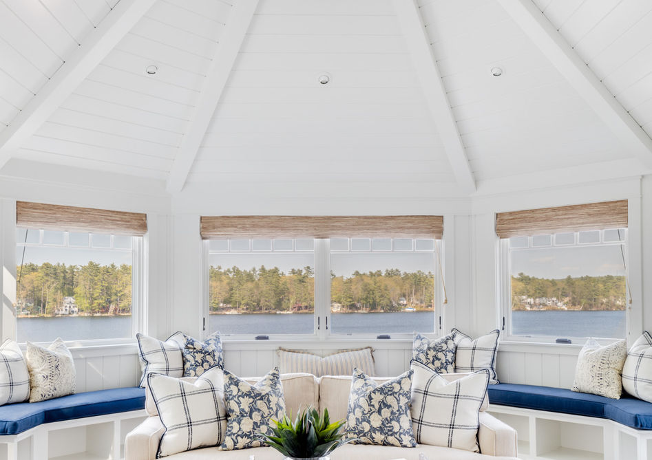 Octagonal shaped sun room with built in seating.