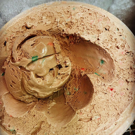 Chocolate peppermint stick ice cream in tub