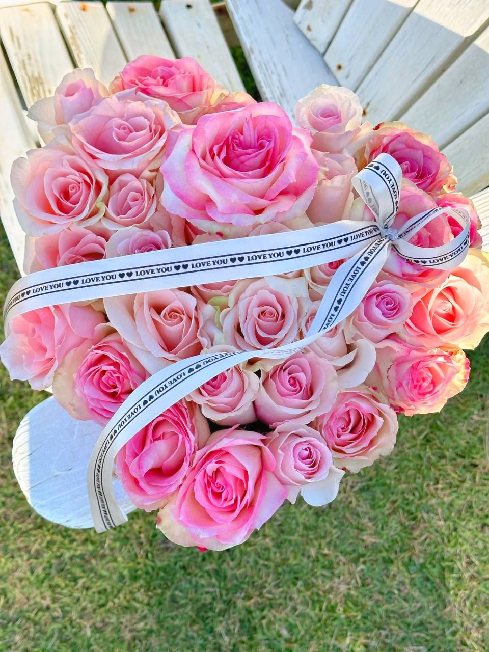 Luxury pink rose heart box arrangement with premium blush roses and romantic ribbon