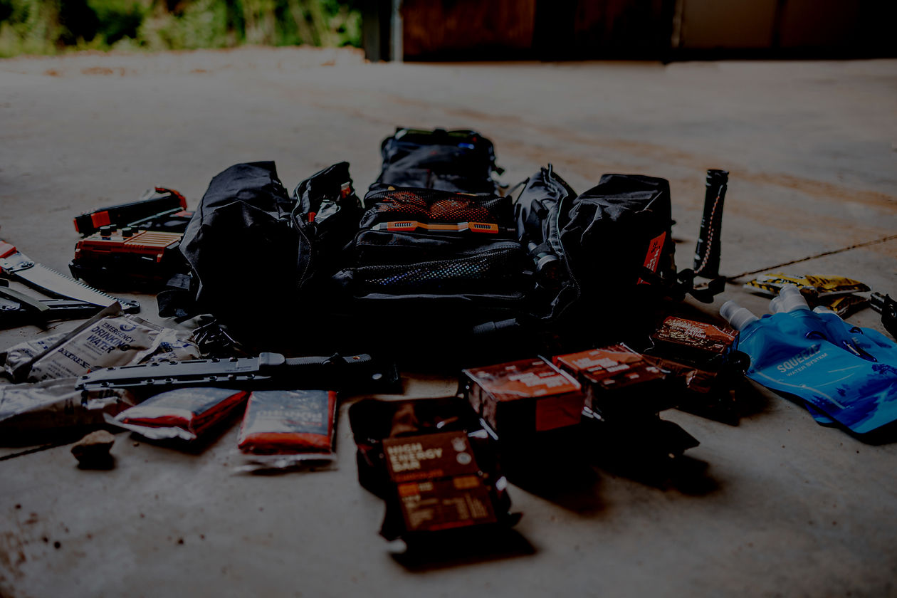 A survival pack for the entire family laid out for easy accessibility.