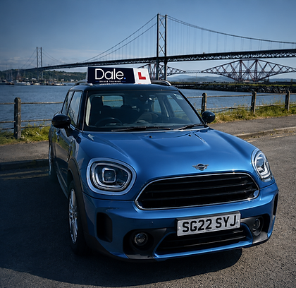 Blue MINI Countryman learner car parked with Forth Bridges in the background