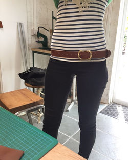 Custom Belt with enough holes punched so it can be worn low slung or higher up on the waist_