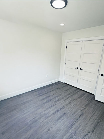 Large second bedroom with plenty of natural light and large closet
