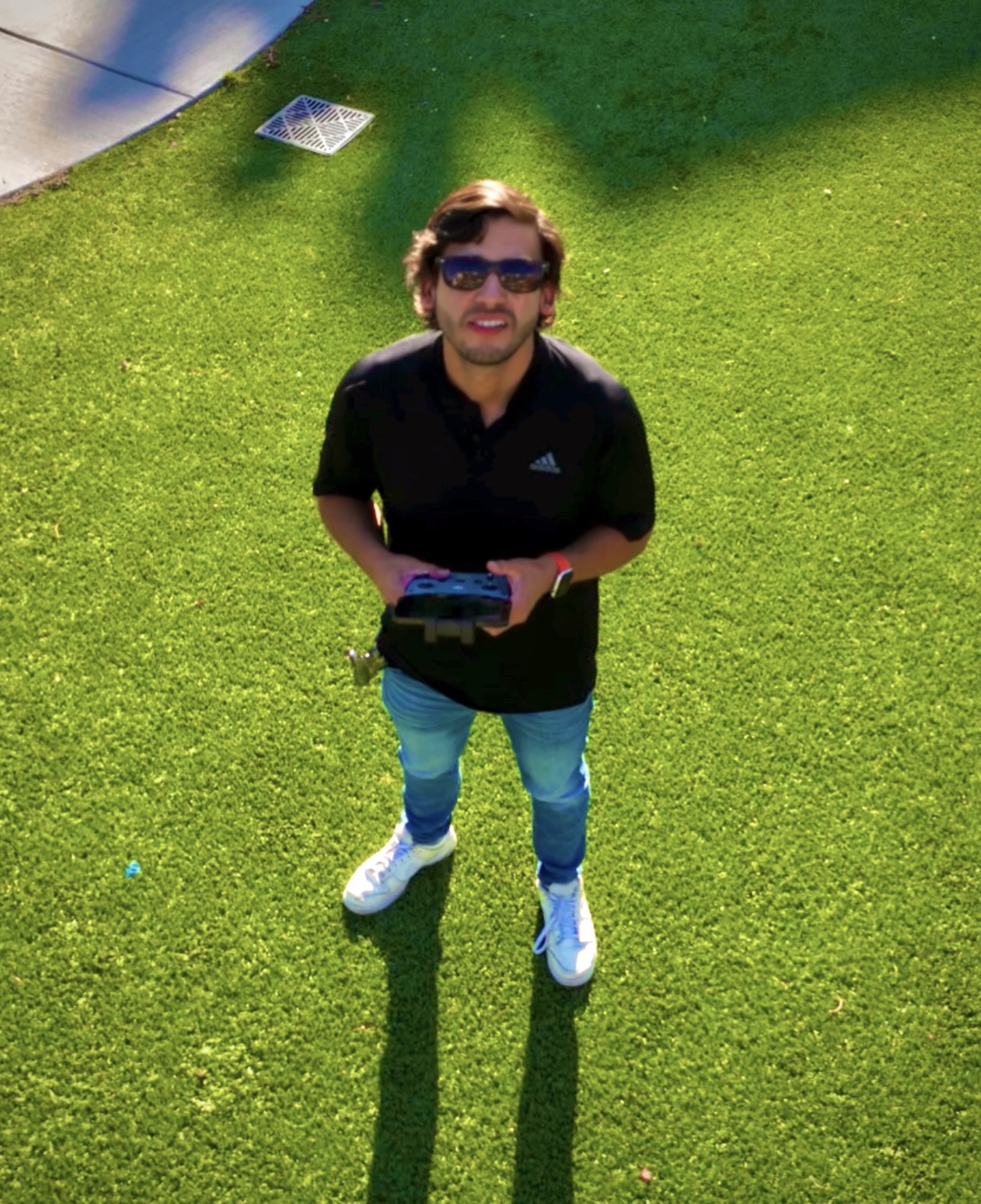 Mario holding a drone controller