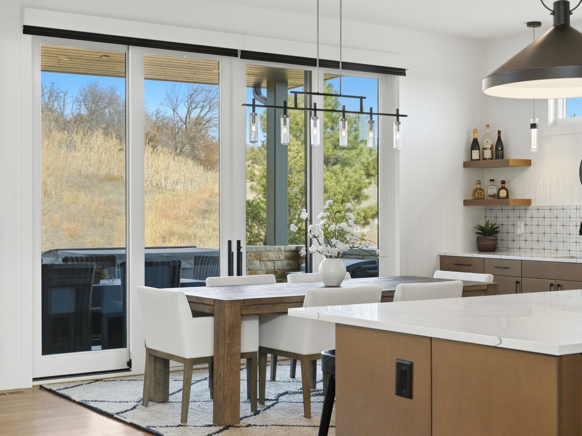 Dining area with floor-to-ceiling windows