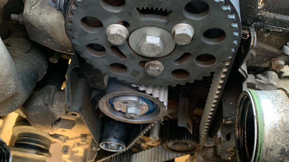 Close-up of a car engine's timing components