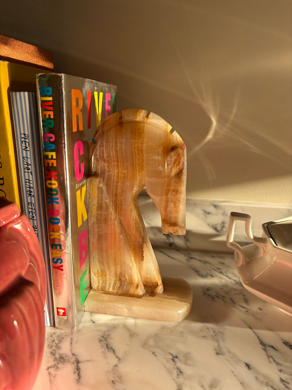 Thumbnail: Vintage boekensteun onyx paardenhoofd