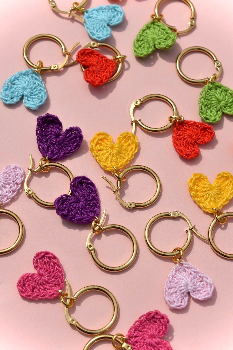 Thumbnail: Tiny crocheted heart hoops
