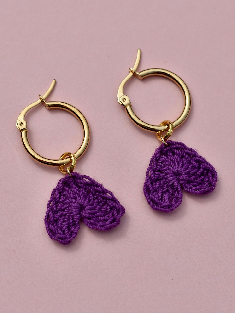 Thumbnail: Tiny crocheted heart hoops