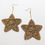 Thumbnail: Sparkly gold crocheted star earrings
