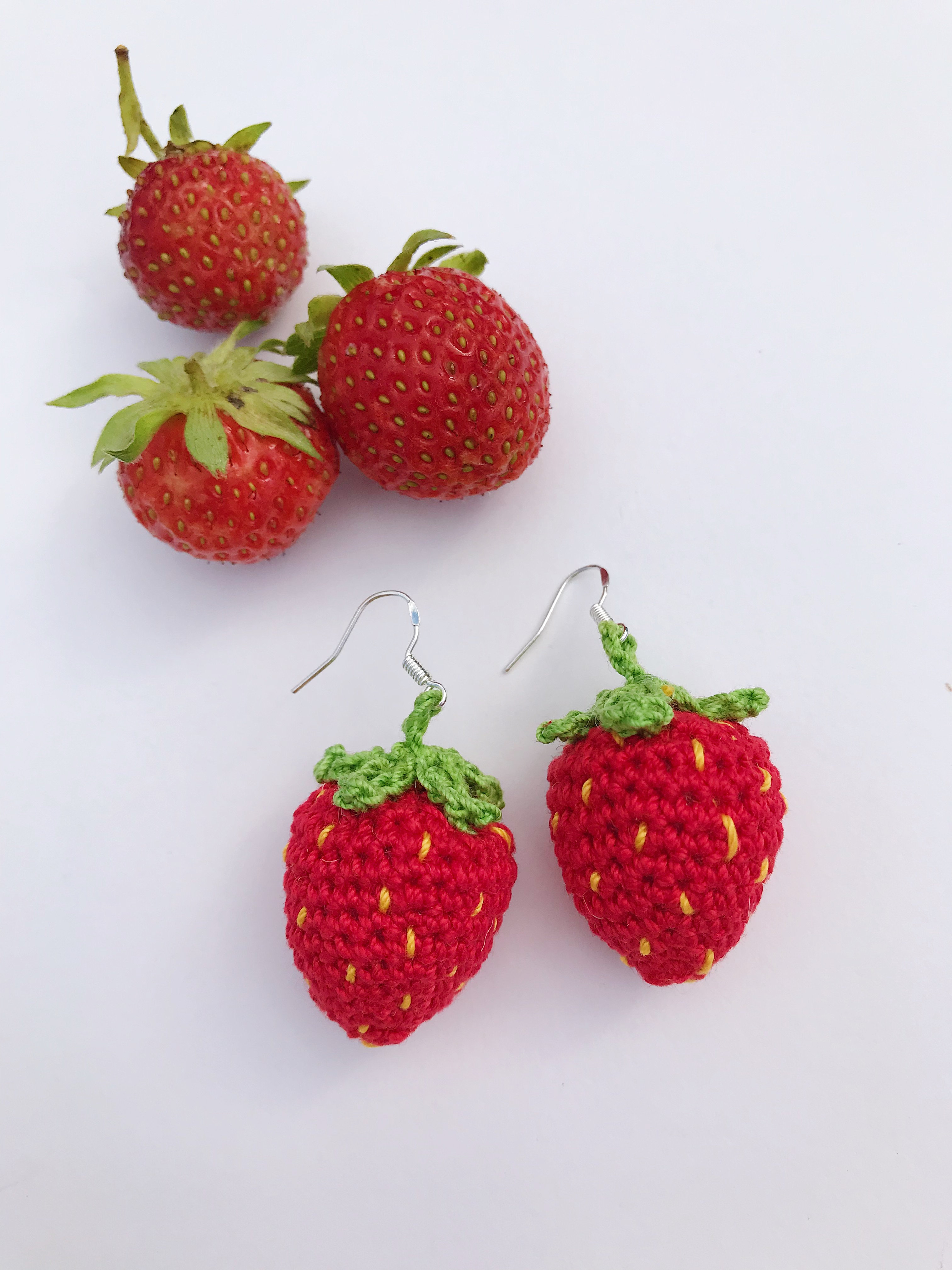 Crocheted strawberry earrings Realm.designs