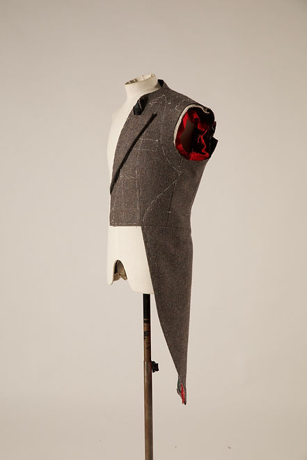 Half tailcoat from the front side on a mannequin