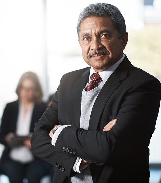 professional-senior-businessman-standing-with-cros