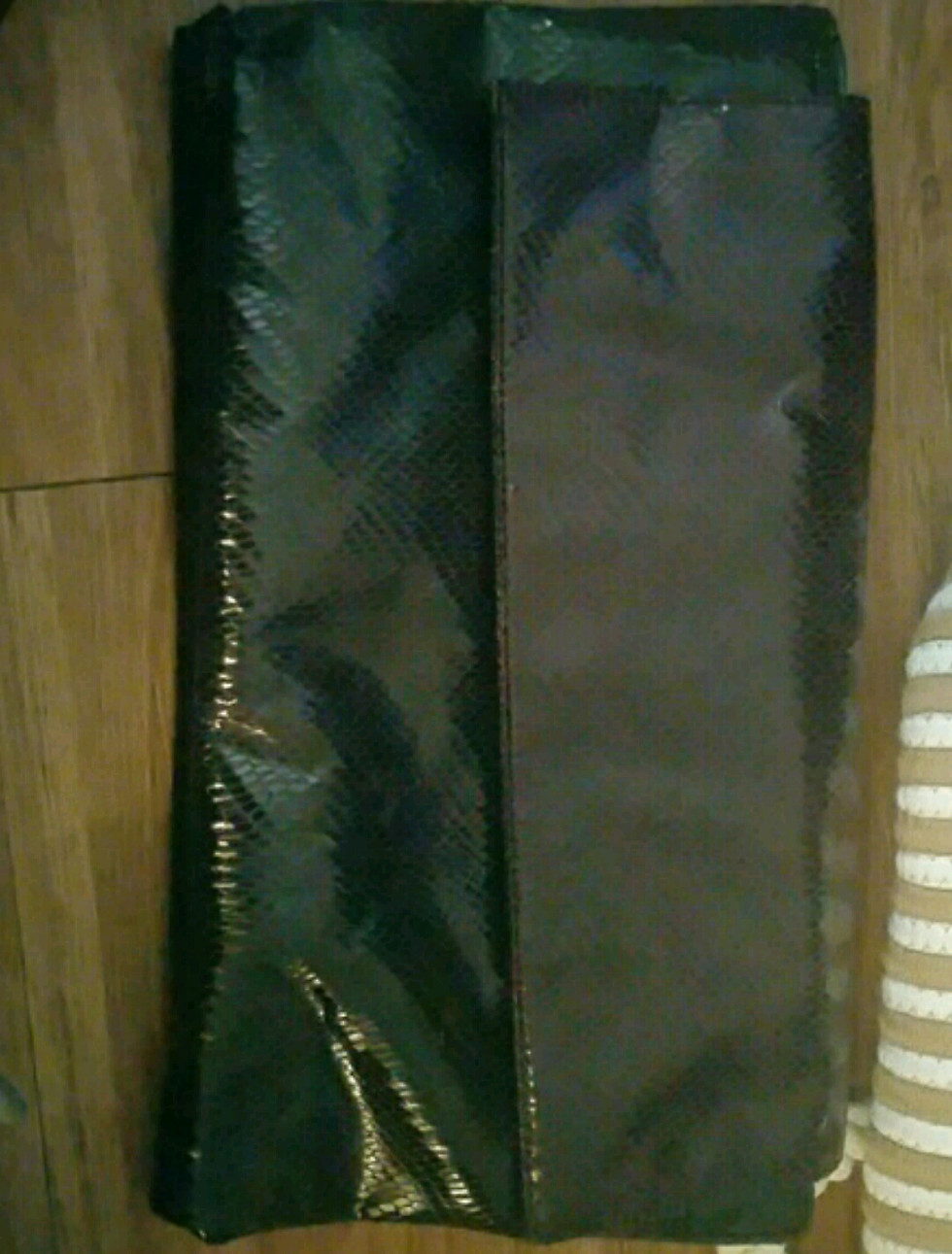 Thumbnail: Purple and black clutch 
