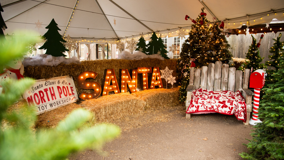 Festive North Pole Christmas display and holiday decorations at Avila Valley Barn Central Coast California