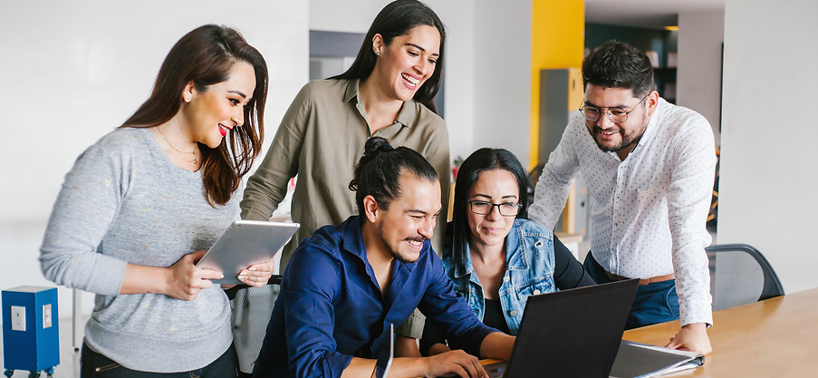 Group of latin business people working together as a teamwork while sitting at the office 