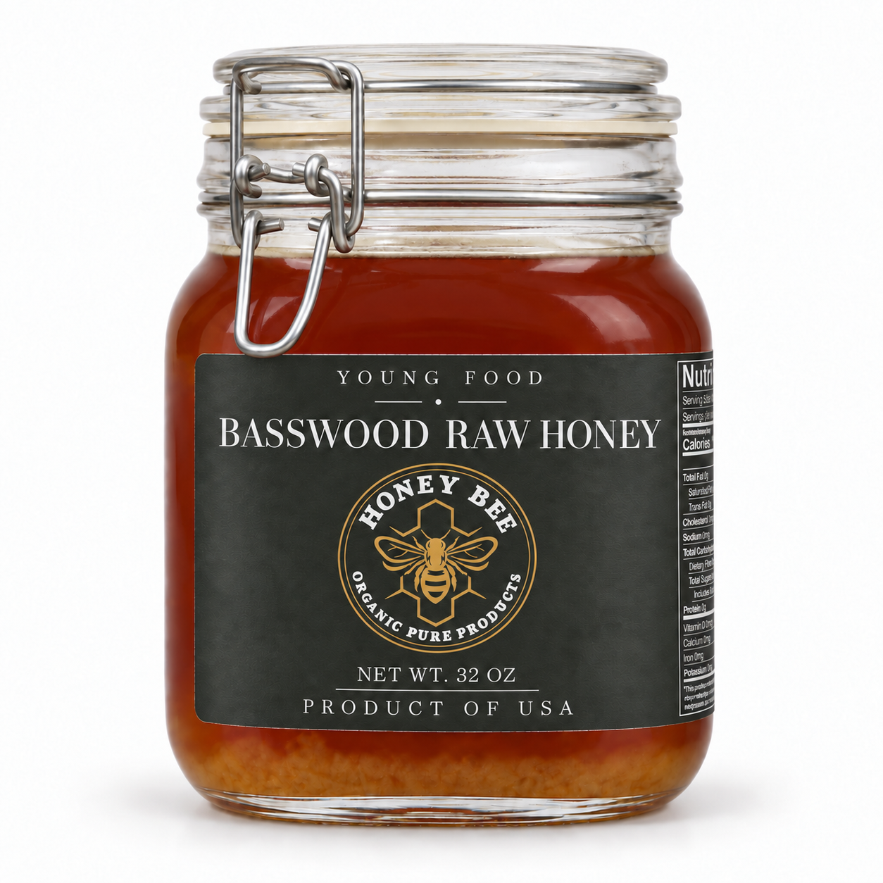 Young Food Basswood Raw Honey in its 32 oz clamp-top glass jar with a black label and gold bee emblem