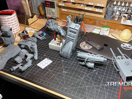 The 74-Z Speeder Bike 3D prints occupy the work bench