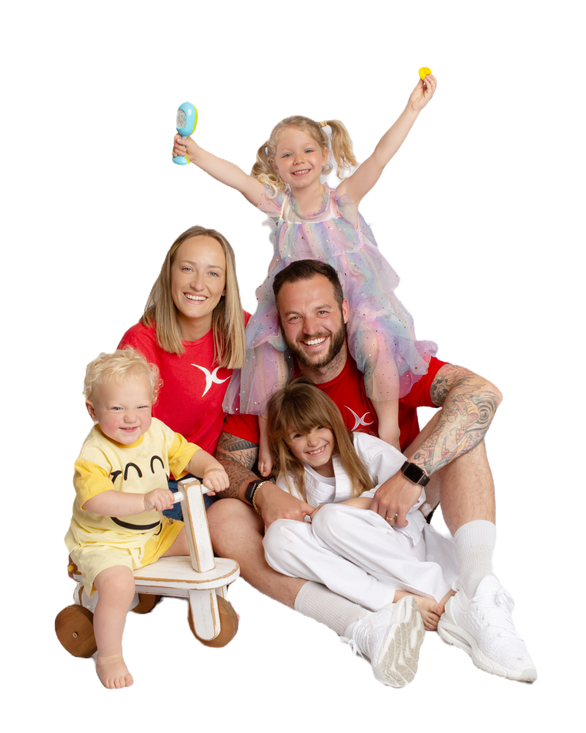JC Academy team with children