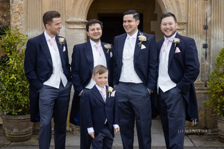 Here come the Boys, Groom, Groomsmen and page.