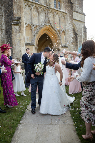 Kissing in a show of confetti