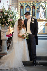 Natasha and Marc looking lovingly in to each others eyes.