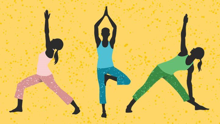 Three women doing yoga.