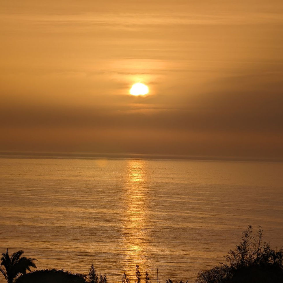 A vibrant orange sunrise over the ocean