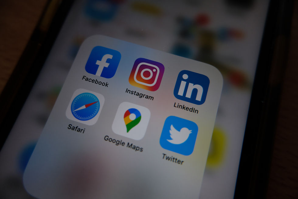 Phone screen with social media icons