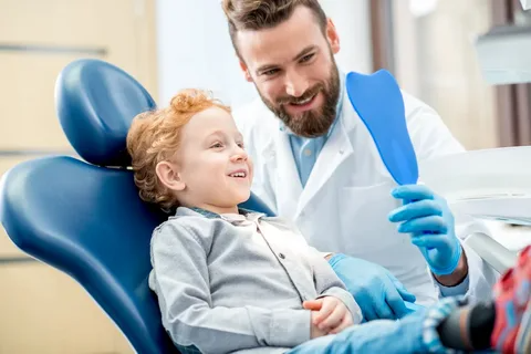 Child receiving a dental checkup at Adorable Smiles Pediatric Dentistry in Corinth