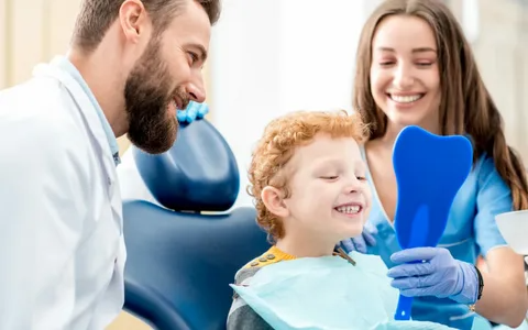Young children brushing teeth at home as part of preventive dental care routine