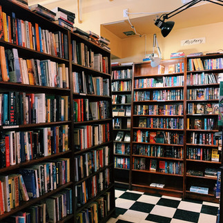Inside Trident Booksellers Cafe featuring shelves with an endless supply of books
