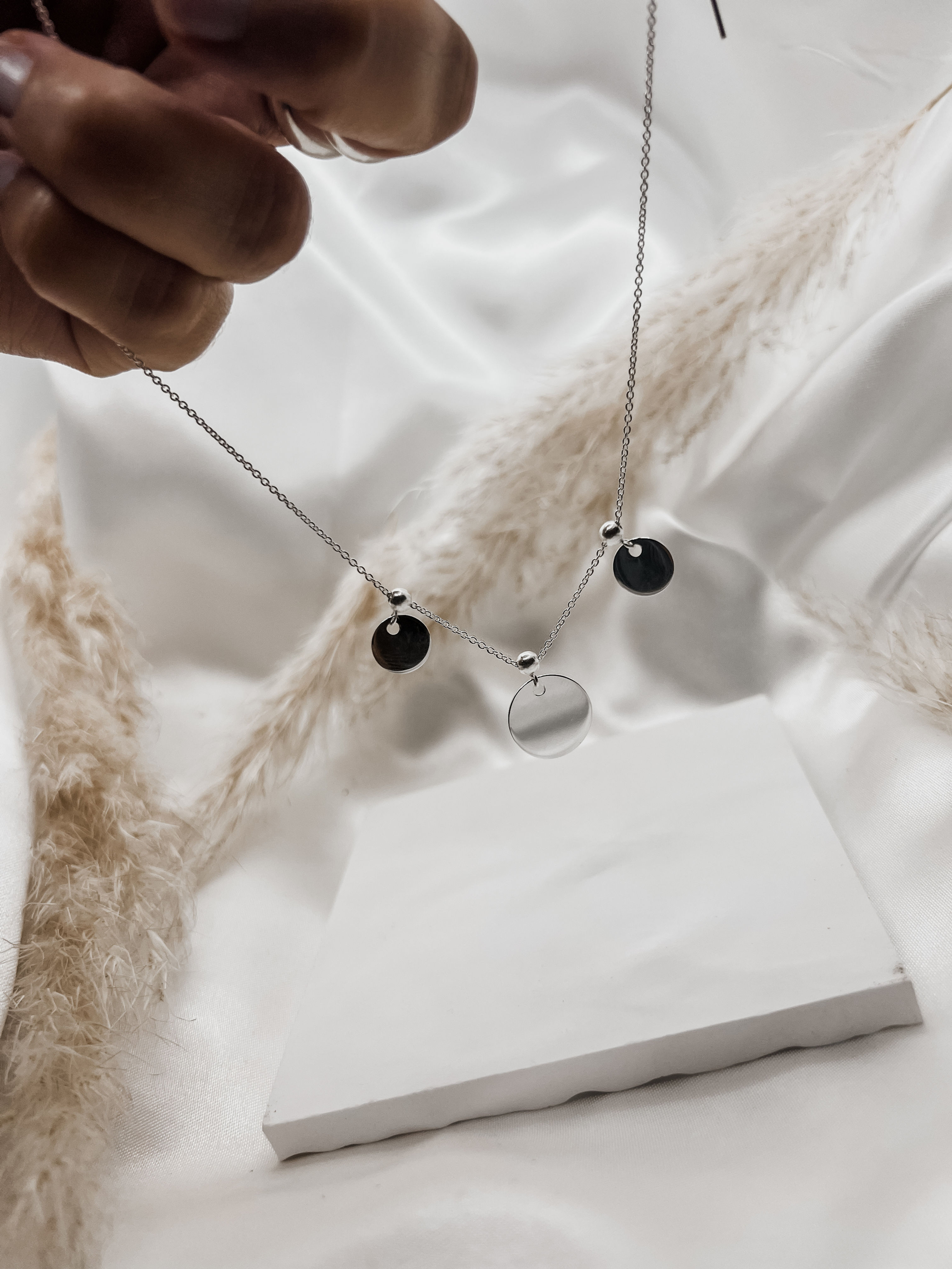 Collier medailles coulissante