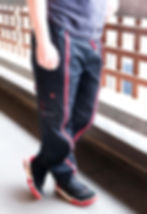 Adapted Trends Black Cargo Trousers legs shot showing front full length zip and side pockets
